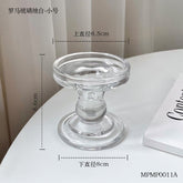 Clear glass Candle Holder S.K. with a round base and elegant design, perfect for home decor.